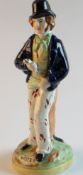 A Staffordshire figurine of `Gin and Water`
