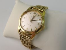 OMEGA, A GOLD (18ct) SEAMASTER AUTOMATIC WRISTWATCH; The copper finished lever movement 34 jewels,