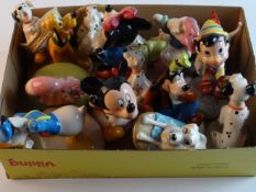 Royal Doulton `Disney` - a large parcel of `Mickey Mouse` and Disney related figurines (