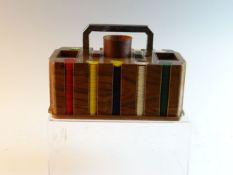 A vintage games accessories holder with full set of multicoloured counters and dice and having a