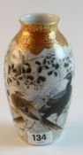 A Kutani baluster vase decorated with birds in a floral scene, 6.5 ins (16 cms) high