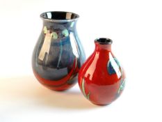 POOLE Two flambé vases with grey leaf decoration, 6.25 ins (16 cms) and 5.25 ins (13 cms)