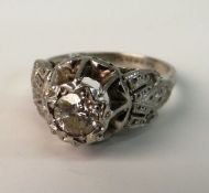 A BELLE EPOQUE DIAMOND COCKTAIL RING; The transition cut diamond in illusion setting on tiered