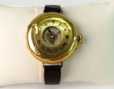 A GOLD (18ct) HALF-HUNTER FOB WATCH; The hunter case with enamelled outer chapter ring opening to