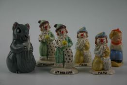A group of decorative ceramics including four Beswick clown figurines, a Wade `Felicity Squirrel`,