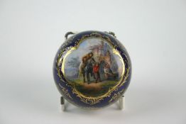 A Meissen circular trinket box of blue and gilt decoration with hand painted panel to lid of a