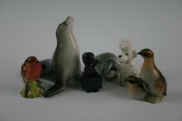 A group of decorative ceramics including Beswick robin and two Russian animal figures