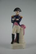 A 19th Century Staffordshire figure of a standing Duke of Wellington with arms crossed and having