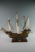 A model ship of the Santa Maria Columbus flag ship 1492 on wooden mount