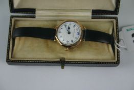 1920s gold (9ct) wristwatch with white enamel circular dial Arabic numerals, the twelve enamelled