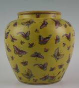 A 20th Century yellow ground Chinese planter decorated with numerous moths and butterflies, 9.5
