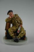 A Royal Doulton Classics `The Railway Sleeper` figurine of a WWI soldier asleep, serial number