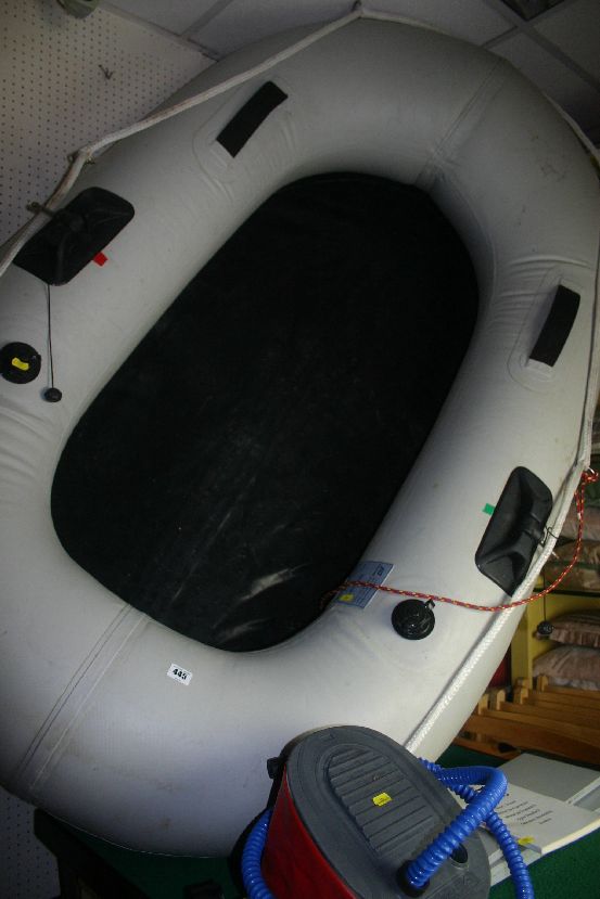 A modern Plastino inflatable dinghy with pump