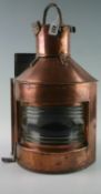 A late nineteenth century, early twentieth century copper port lantern of barrel form with reeded