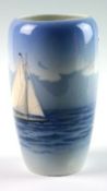 A Royal Copenhagen porcelain vase decorated with sailing boats at sea, character mark and serial