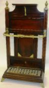 A late Victorian mahogany and brass mounted hall stand with stepped rectangular base on splayed