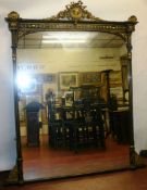 A fine 19th Century ebonised and gilt carved wood mantel mirror with reeded Corinthian columns (