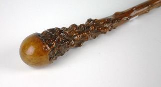 A nineteenth century Irish thorn walking stick with polished bulbous handle and naturally tapered