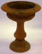 A late Victorian terracotta garden planter of overall stylised leaf decoration, fluted circular