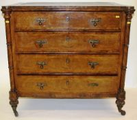A Victorian mahogany and walnut veneered chest secretaire with four long drawers, the first