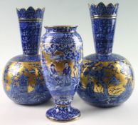 A group of three J Kent Foley Ware ceramics comprising two bottle vases and one other vase, each