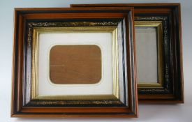 A pair of fine late Victorian picture frames with oak corniced borders, ebonised, carved burr walnut