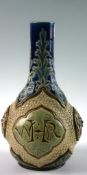 A late Victorian Doulton Lambeth bottle pottery vase potted by Arthur Barlow, the vase with circular