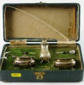 A cased George VI silver condiment set. Mark of Goldsmiths & Silversmiths Co., Birmingham 1941.