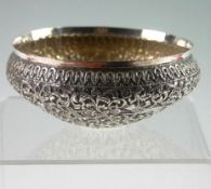 An early twentieth century Indo-Persian silver bowl. Of tapered vase form, the body engraved with