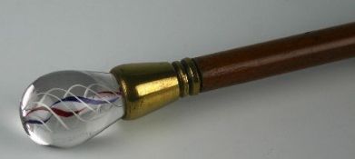 A nineteenth century walking stick with blue, red and white opaque twist glass lob handle, gilt