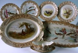 A Royal Worcester porcelain twenty eight piece game service, each piece printed and painted with