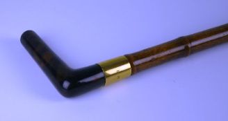 An early nineteenth century gold (18ct), tortoiseshell and bamboo walking stick with gold collar