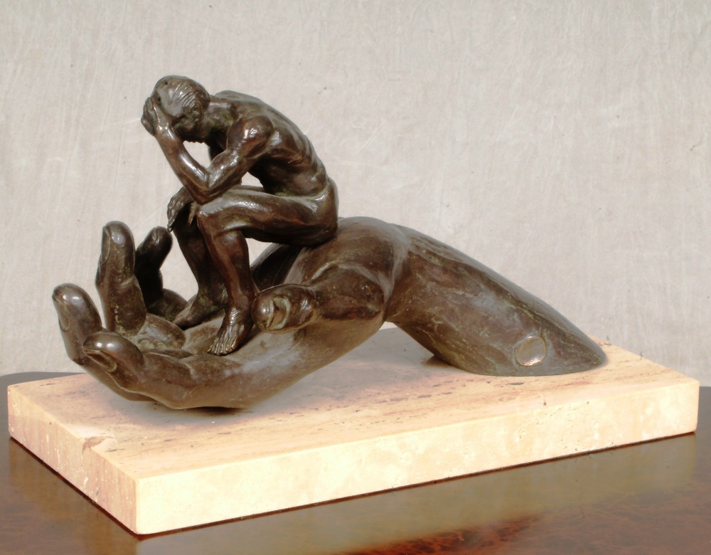 *LORENZO QUINN (b.1966) `Hand of God` A resin bronze study of an open hand holding a small male nude