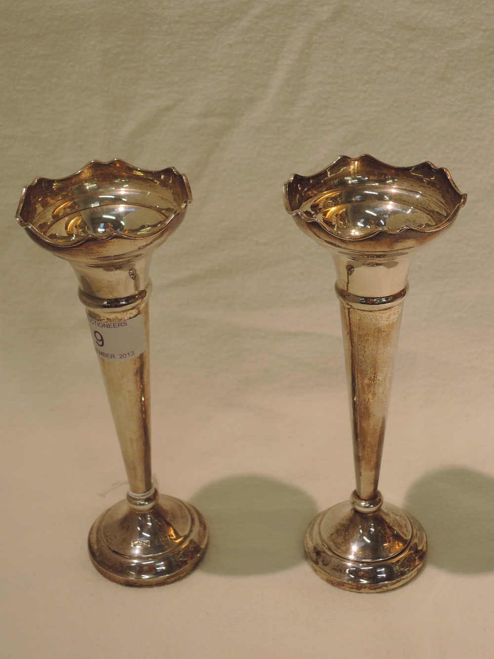 A pair of silver vases, of trumpet form, Birmingham 1986