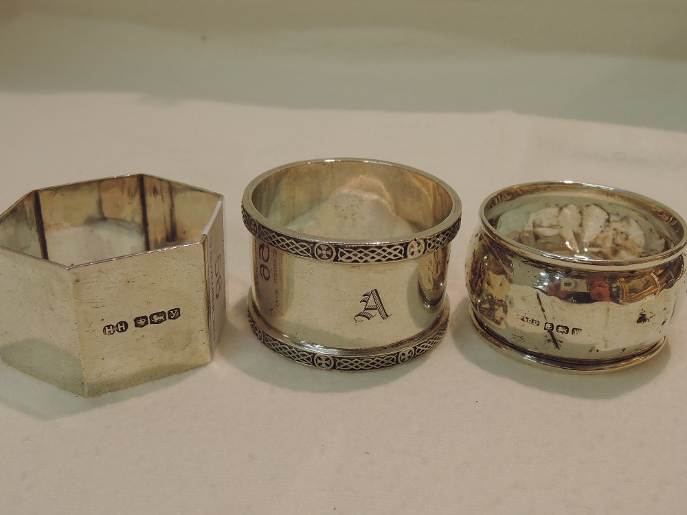 Three HM silver napkin rings, approx 103g