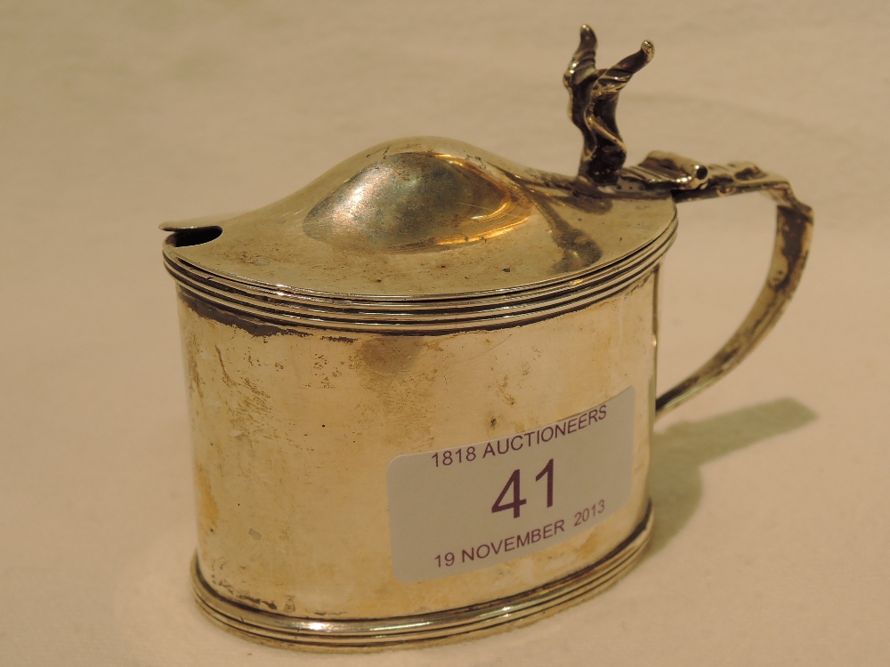 A silver mustard, having blue glass liner, Chester 1910, Stokes & Ireland Ltd, approx 85g
