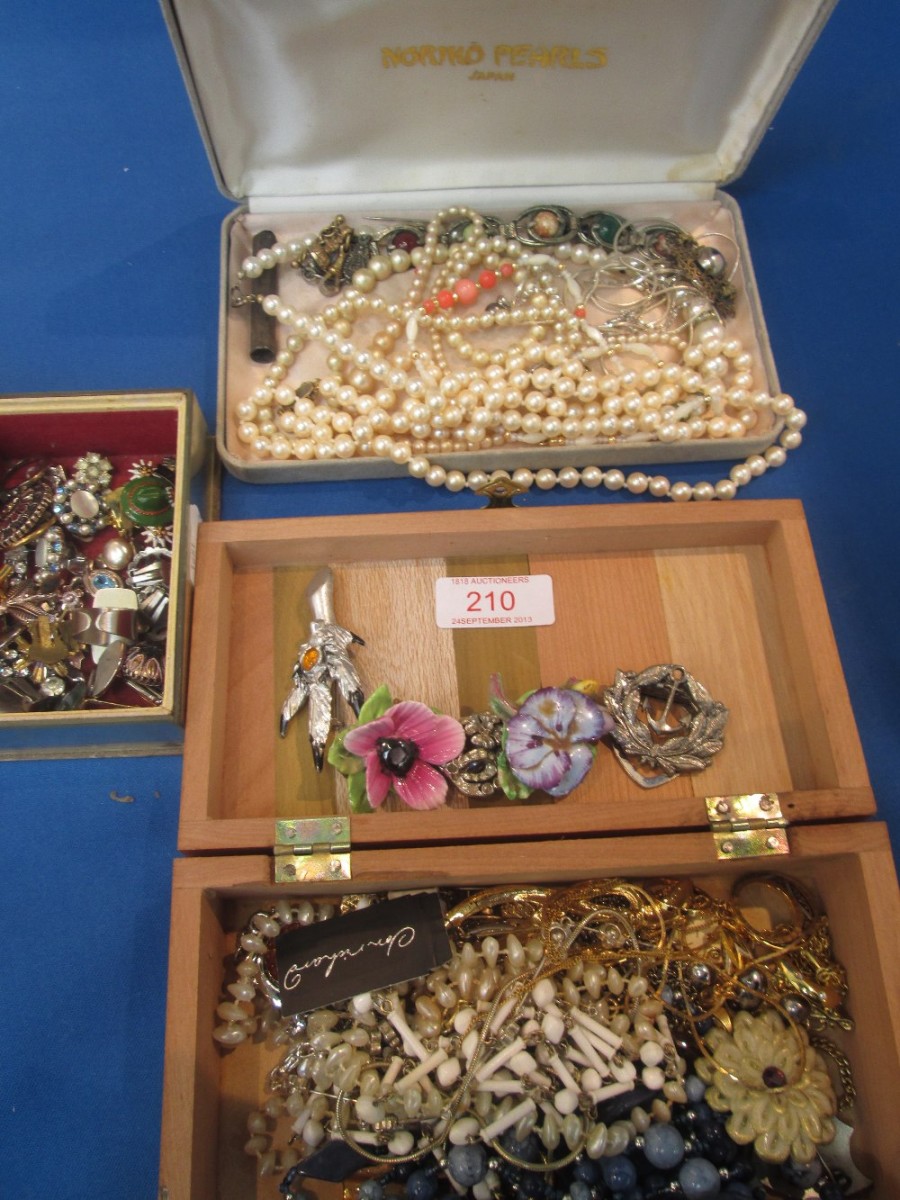 Three small cases of costume jewellery including earrings, cufflinks, brooches and beads etc