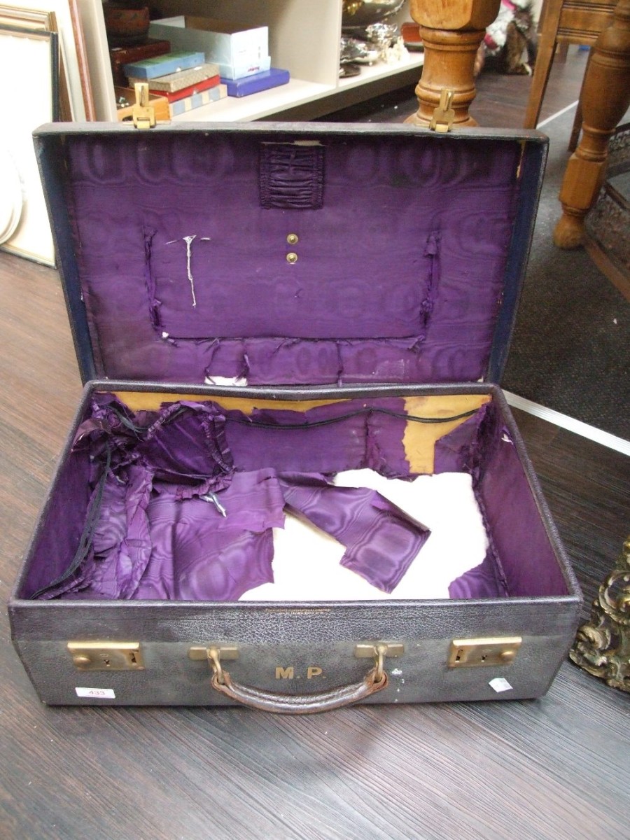 A vintage Finnigans leather vanity case, initialled MP