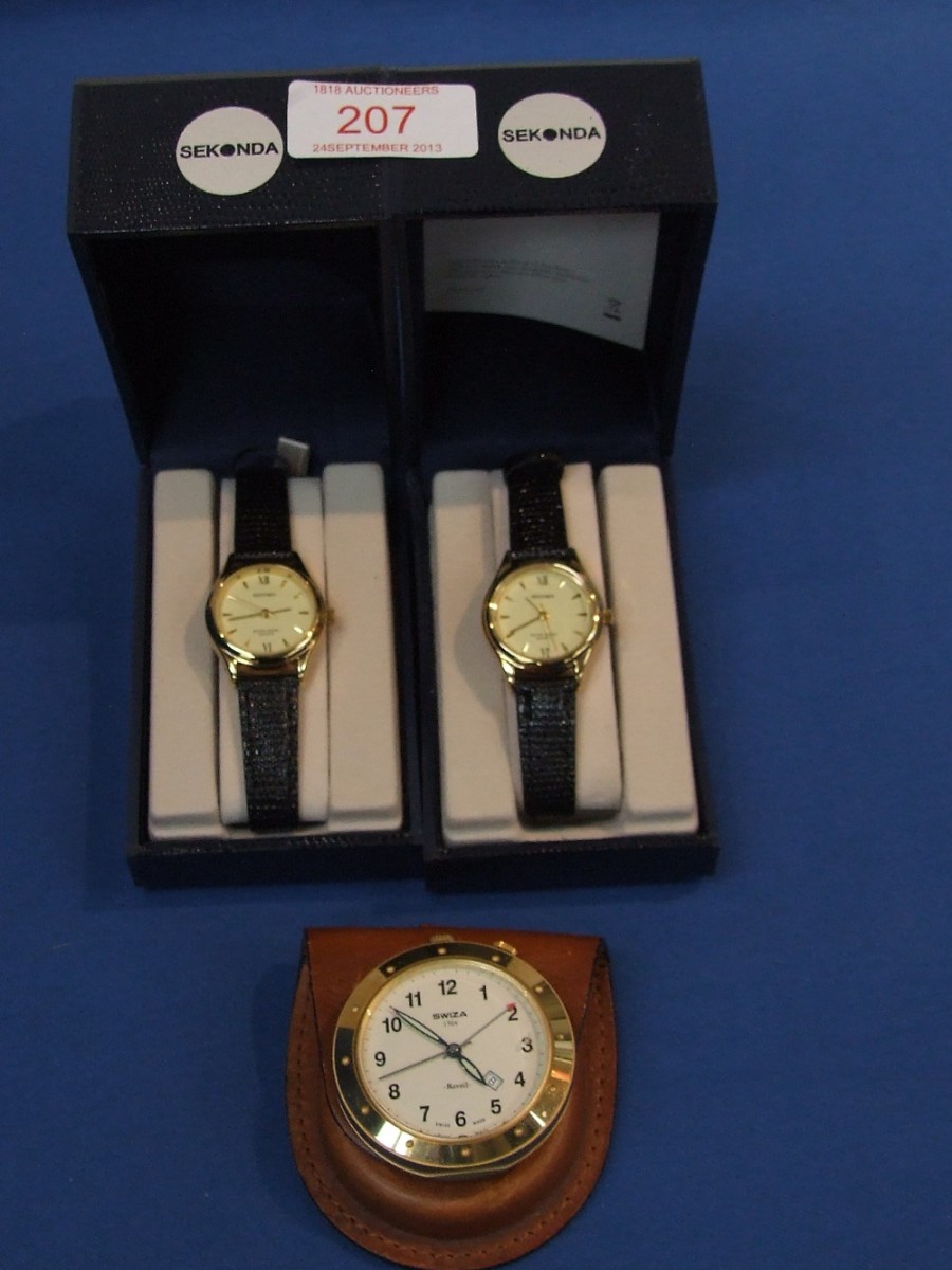 Two ladies Sekonda quartz wrist watches in presentation cases having baton numerals on circular