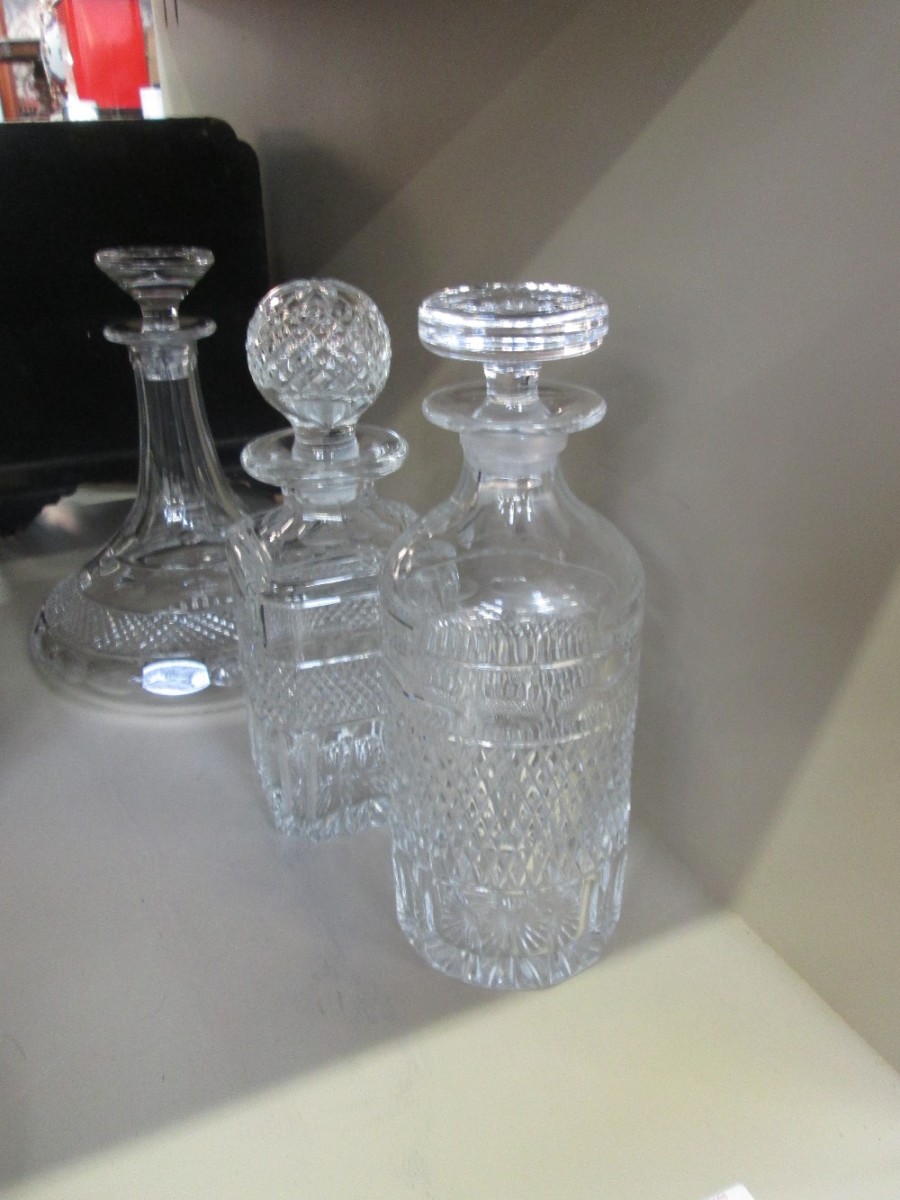 Three various Cumbria Crystal decanters in the Grasmere pattern