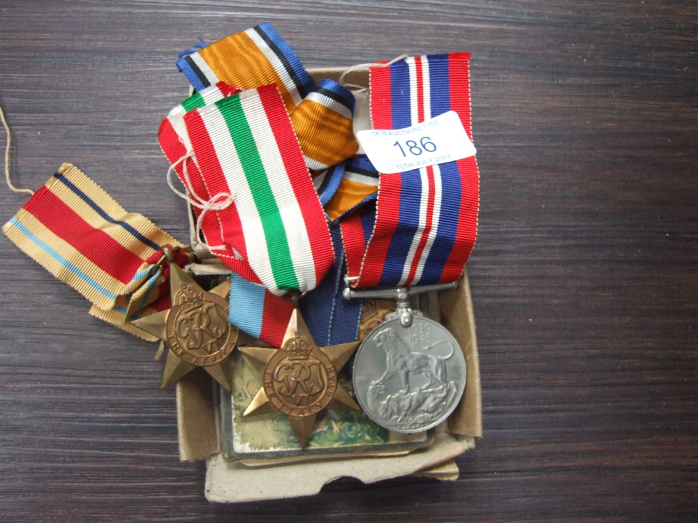 A Second World War medal group comprising 1939-1945 medal, Africa, Italy, and Battle of Britain