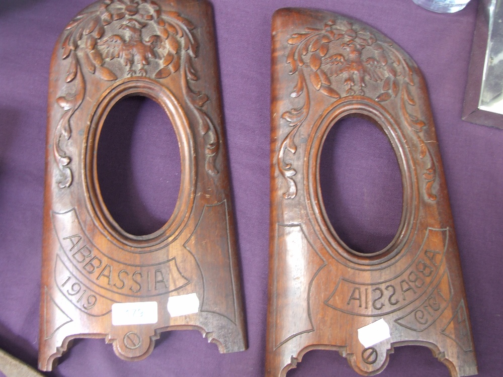 A pair of First World War period trench art photo frames, formed from paddles/propellers carvings