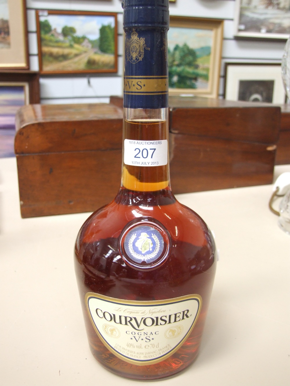 A bottle of Courvoisier cognac (Please note that any alcohol is sold as collectors item and consumed