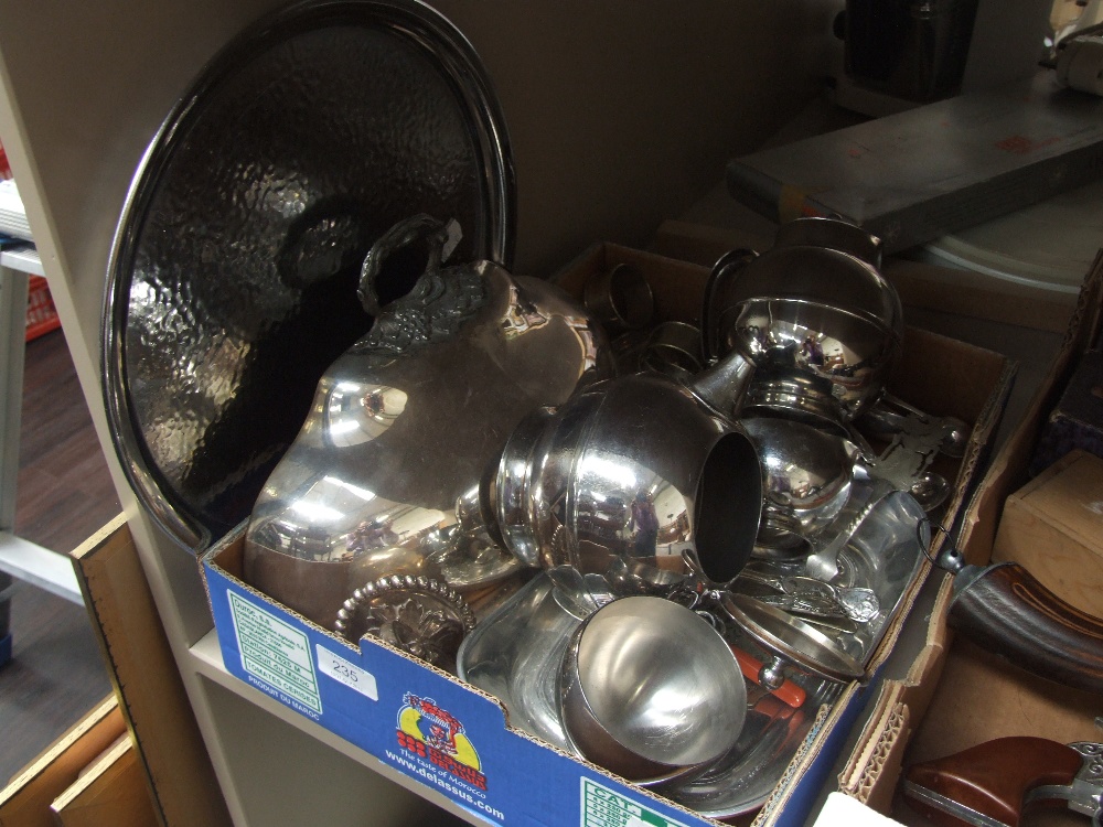 A box of plated ware including napkin rings