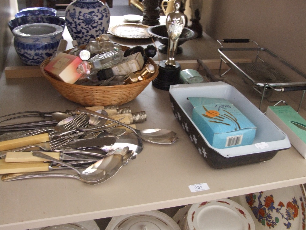 A selection of miscellaneous including flatware, perfume bottles etc