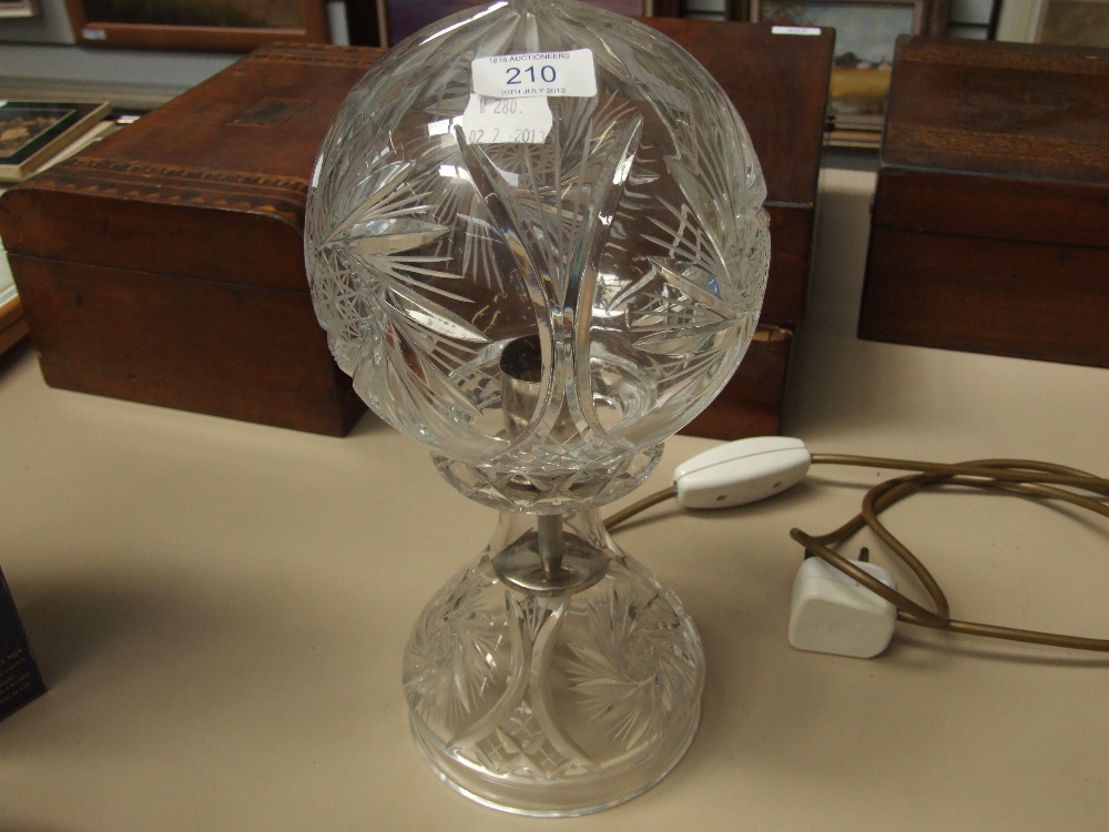 A classic cut glass table lamp