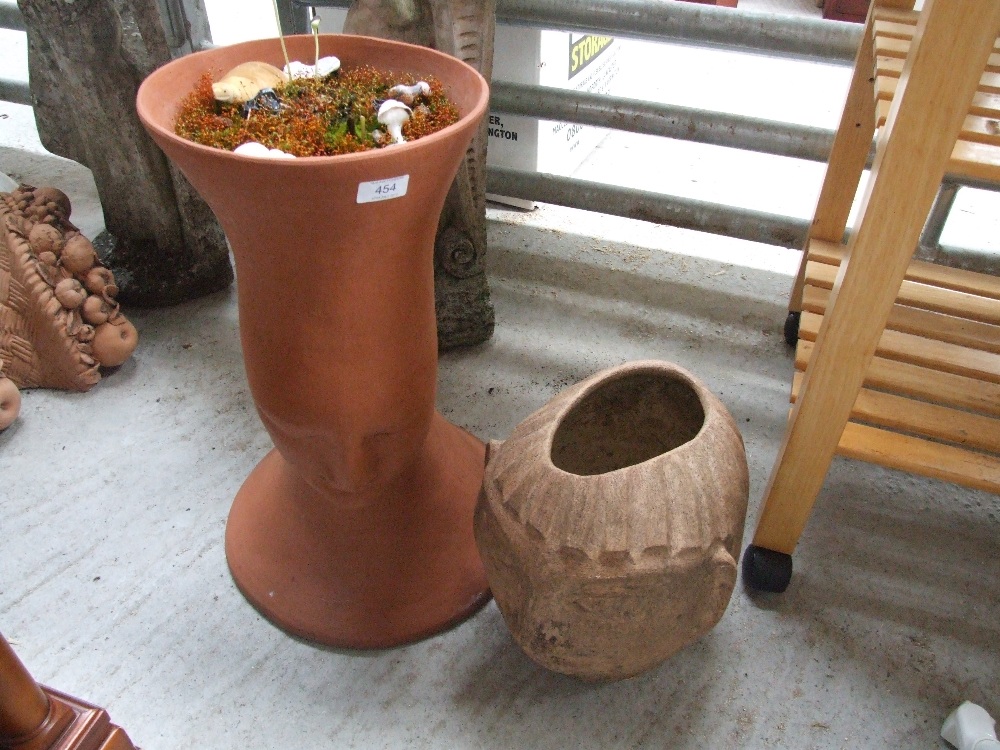 Two Modern terracotta planters modelled as deities