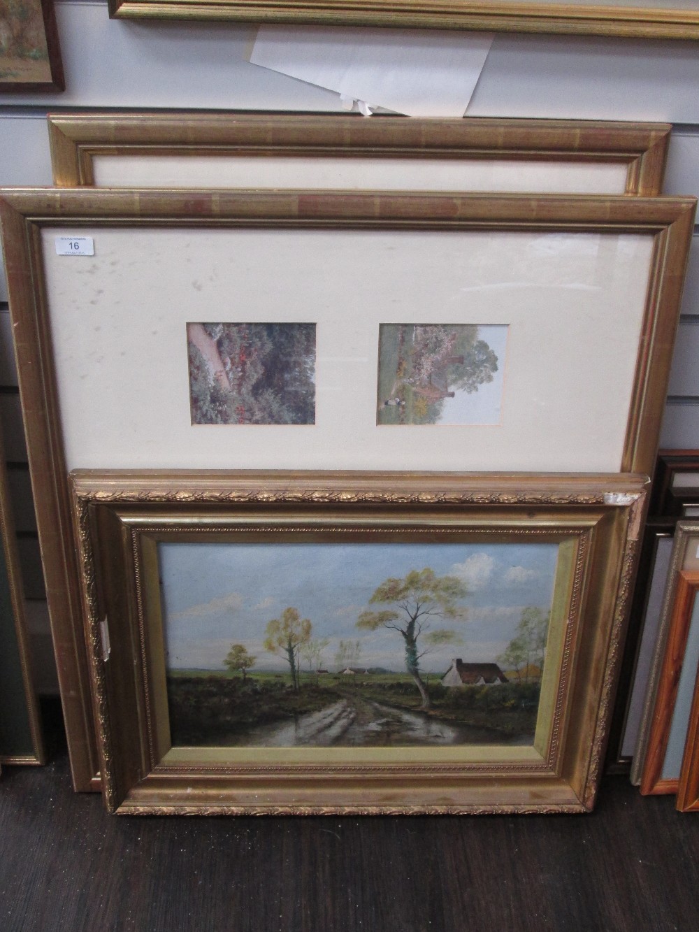 An oil painting, on panel, 19th century country cottages and two multi prints, country cottages