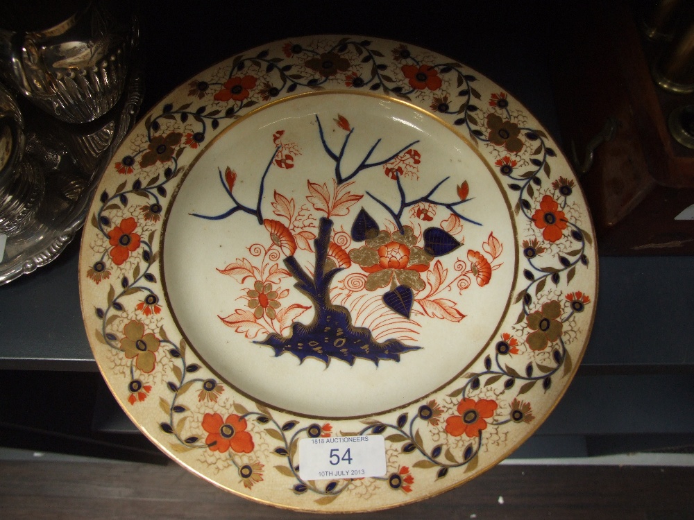 A 19th century Derby plate having gilt heightened decoration