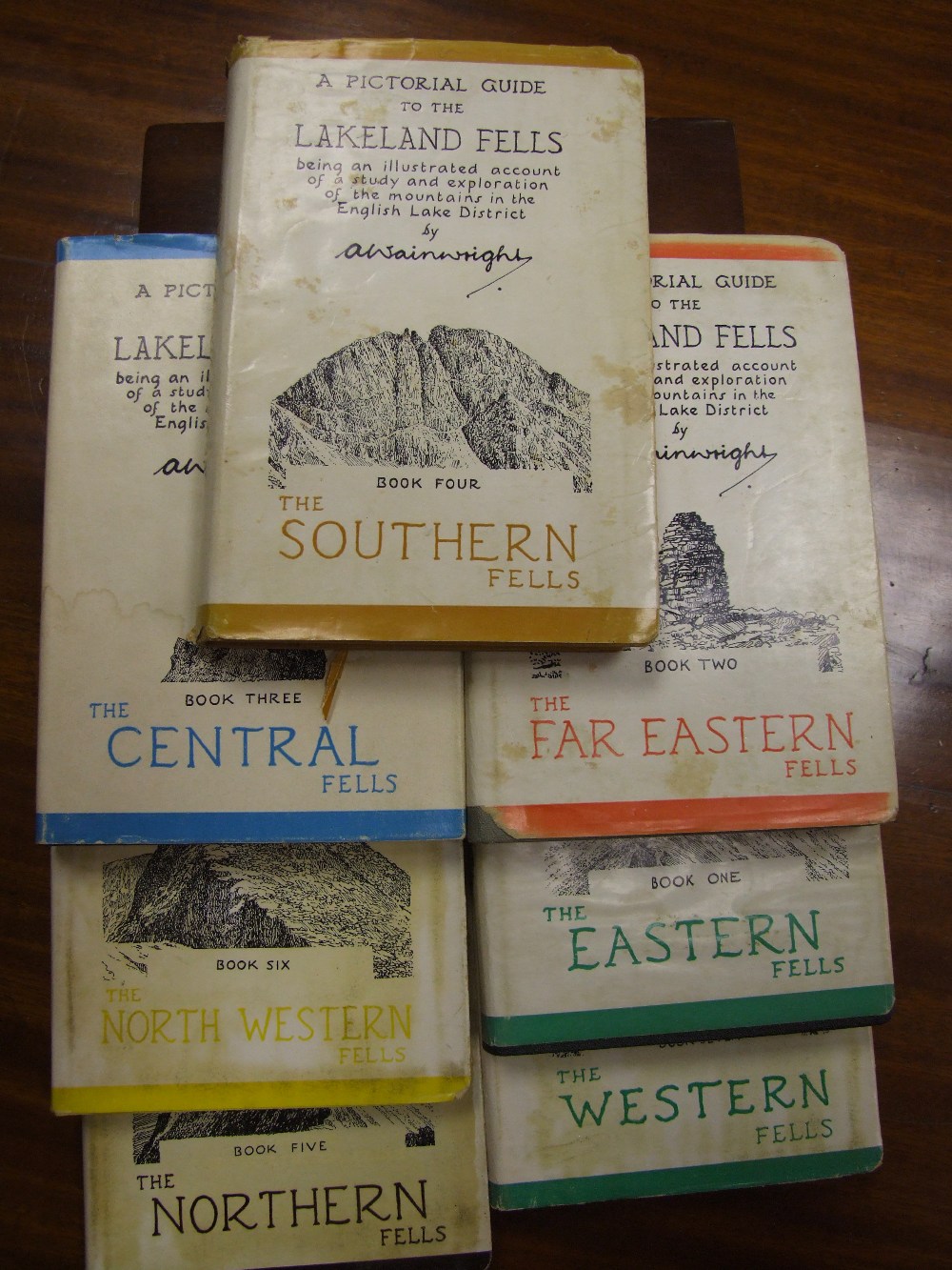 Seven volumes, Alfred Wainwright `Pictorial Guide to The Lakeland Fells`